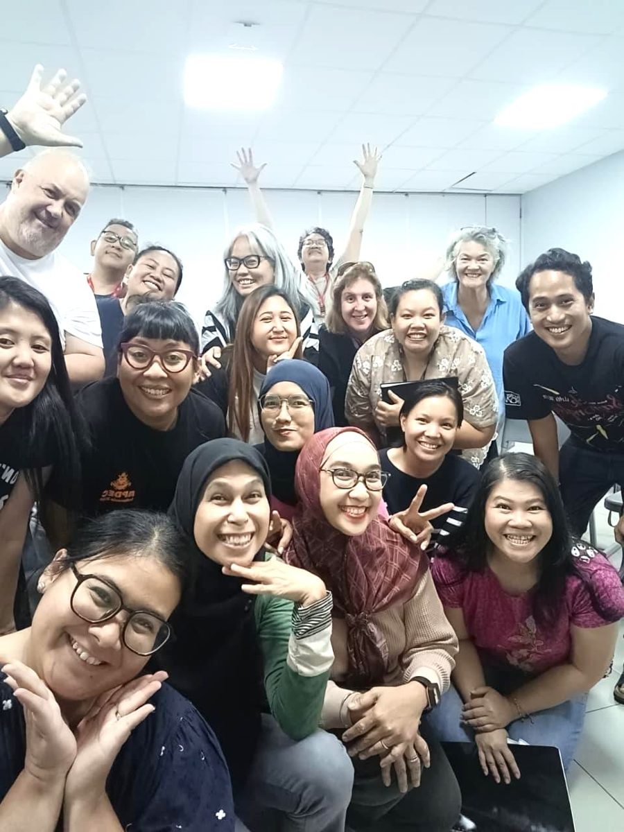 Smiling SJCC members after a rehearsal