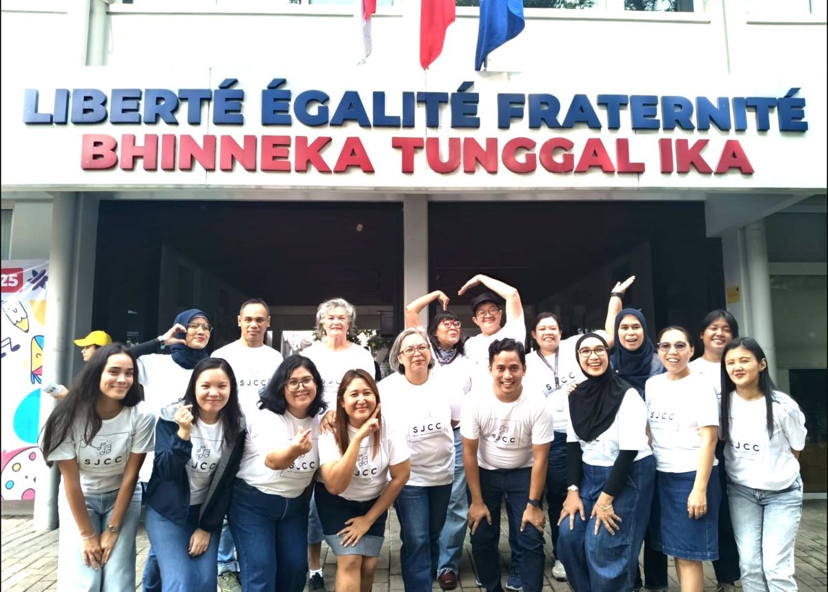 SJCC group photo at an international school